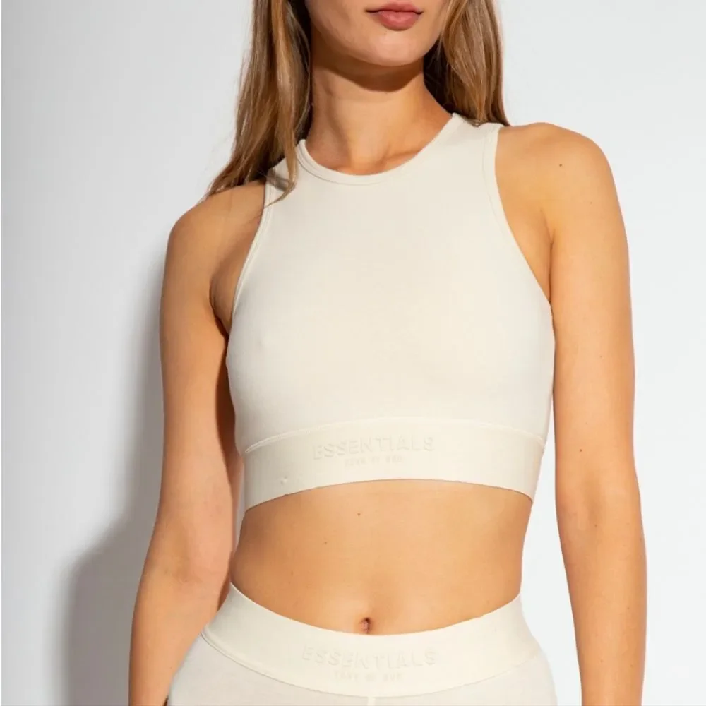 Fear of God Essentials Logo Sport Stretch Cotton Crop Tank in Eggshell Women's M - Picture 3 of 15